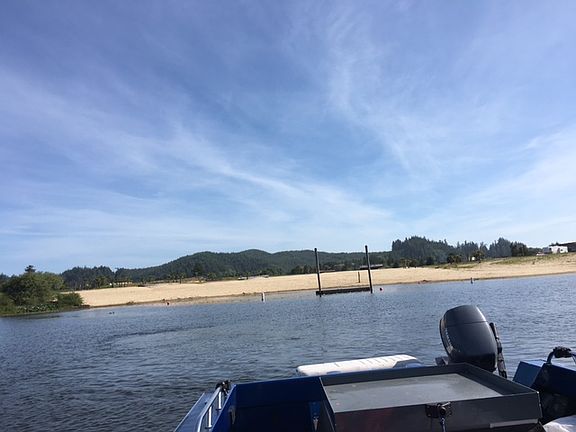 Beach by public boat ramp