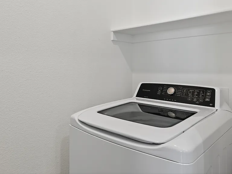 Simplify your routine with a washer and dryer inside your home.