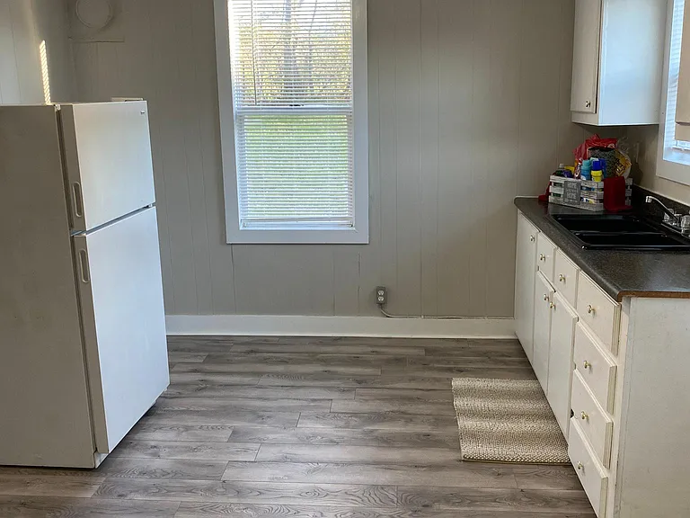 New flooring in kitchen and throughout.