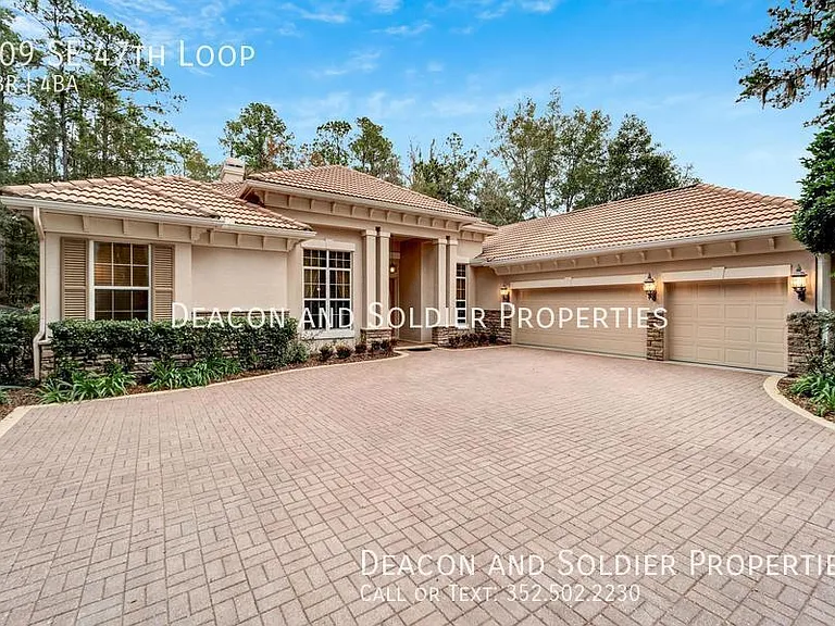 609 SE 47th Loop — Photo 1