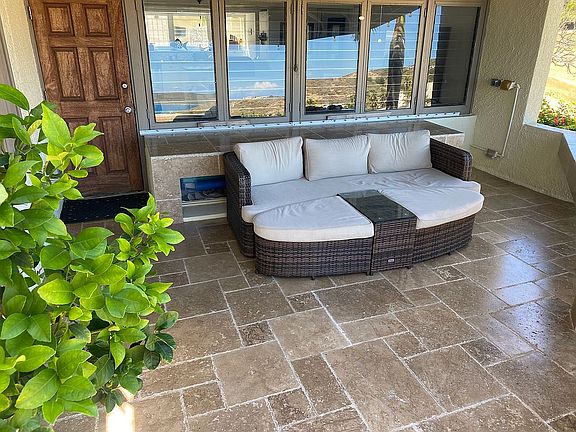 Travertine patio with awning