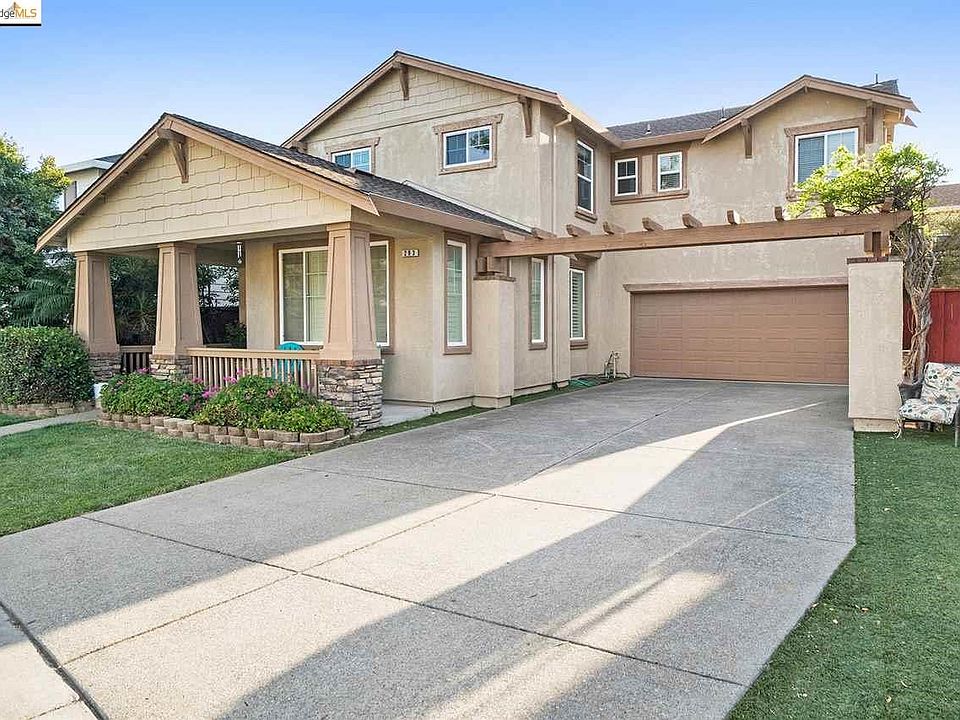 2 car garages with built-in cabinetry, and an extended driveway ideal for parking your vehicles/toys