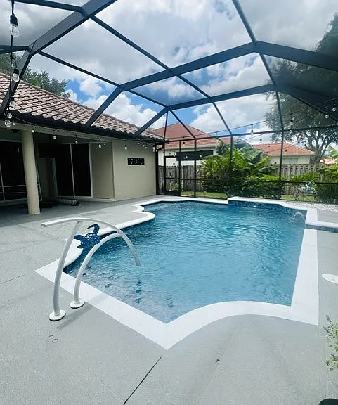 Outdoor, weather-proof party lights with remote app timer (for convenience only), banana trees and Myer Lemon tree that will yield fruit, if you'd like to enjoy this fall. Our landscaper is happy to assist.