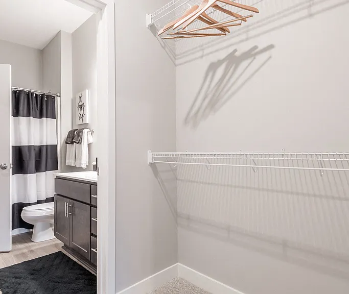 Enjoy the convenience of a walk-in closet with ample shelving and hanging space.