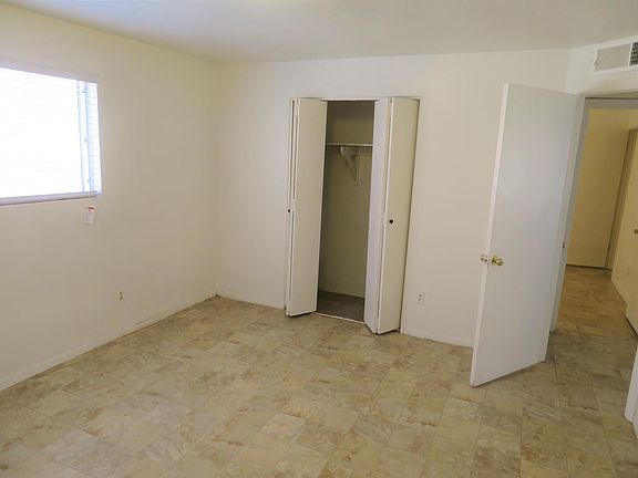 A large bedroom with a double closet.