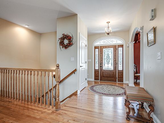 Warm inviting foyer you can decorate for every occasion.