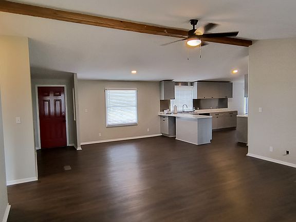 Front door, dining area, kitchen