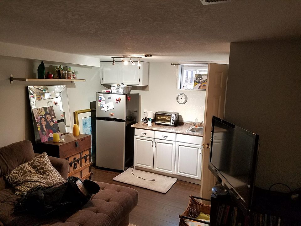 View of kitchen and entry door to bathroom