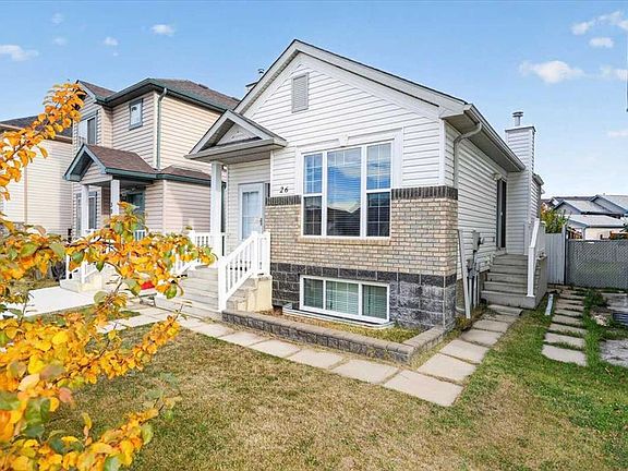 2nd image of 26 S Saddlemead Way NE