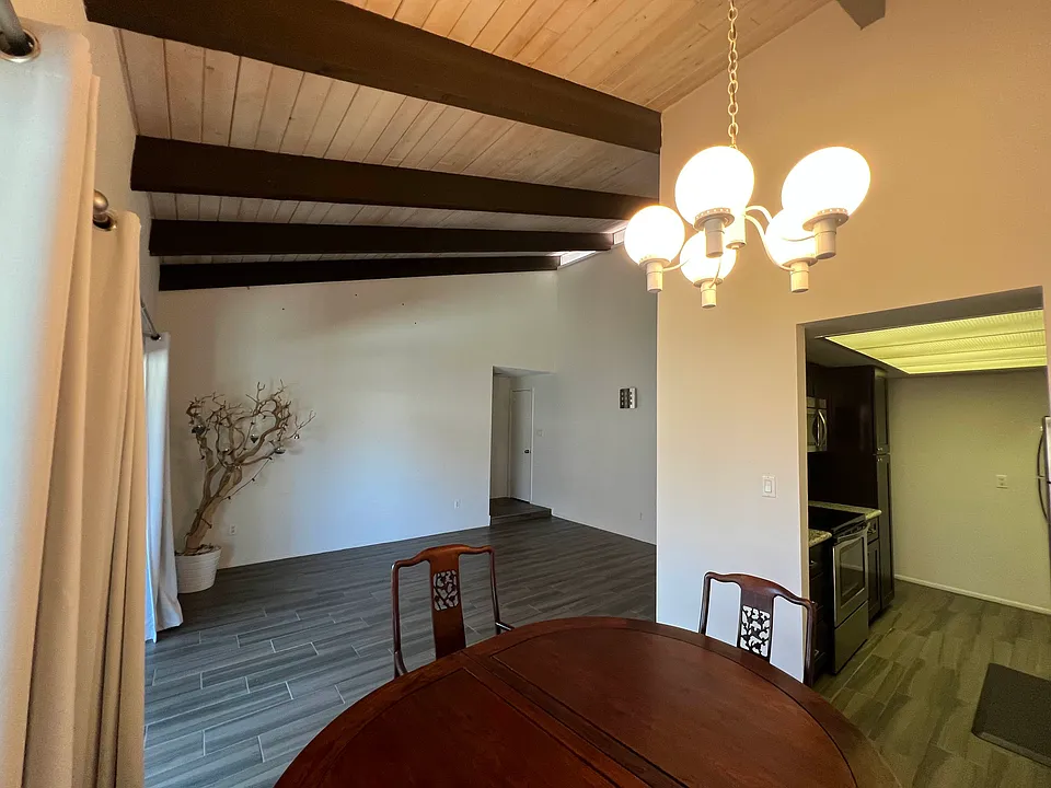 Your view from your dining area at the entrance and into kitchen. 
Note. Dining table will be removed before your move-in.