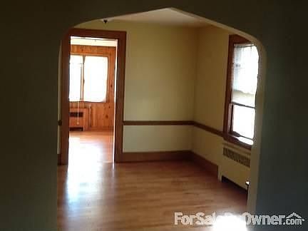 Looking through Dining Room to Den