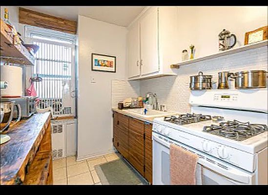 4th image of 33-35 81st St APT 5H