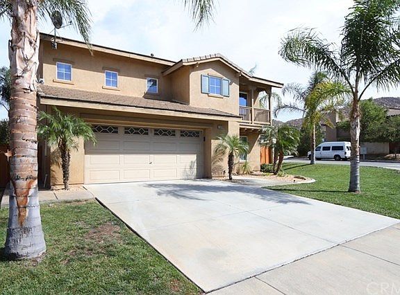 Room to park multiple cars in this long driveway.