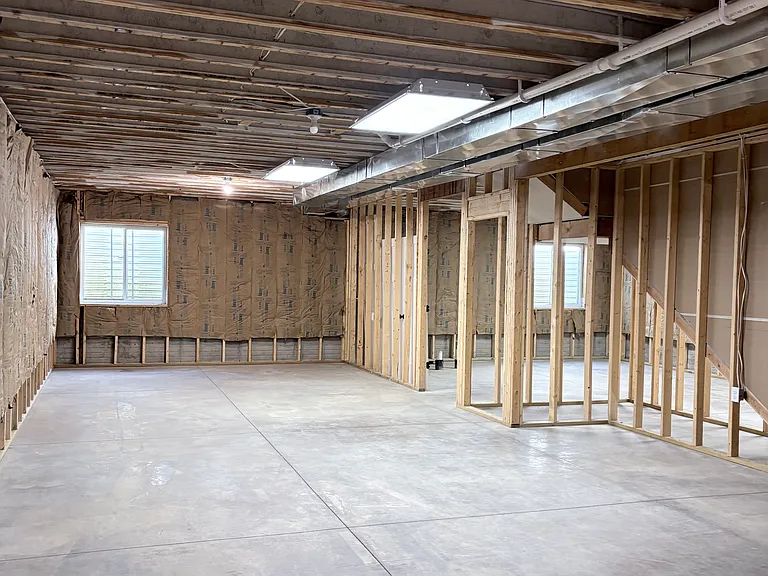 Unfinished basement, high ceilings and lots of storage