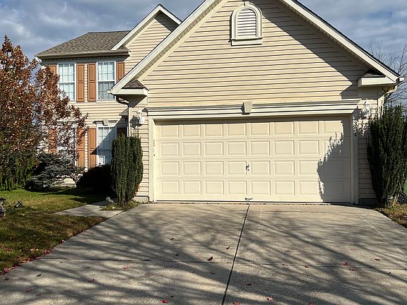 Front view of driveway and garage