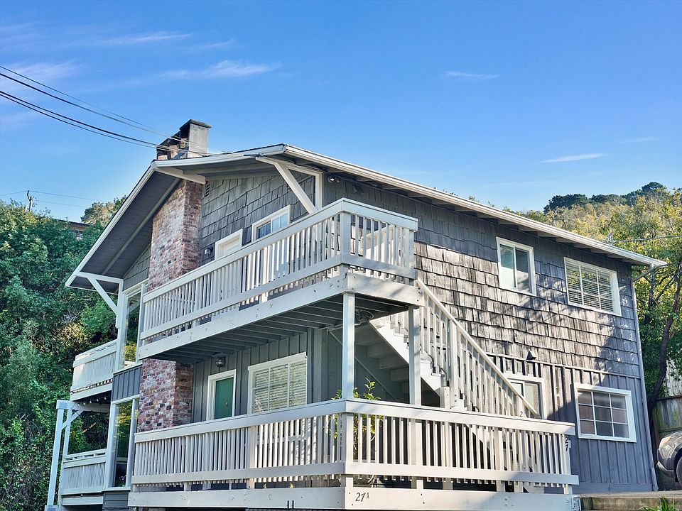 Charming exterior, main level unit with entry deck