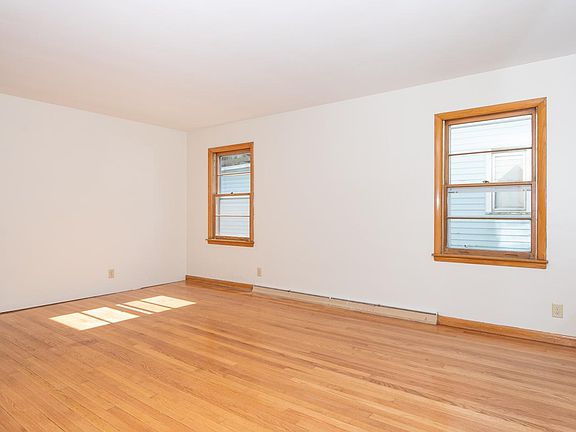Large living room with hardwood floors.