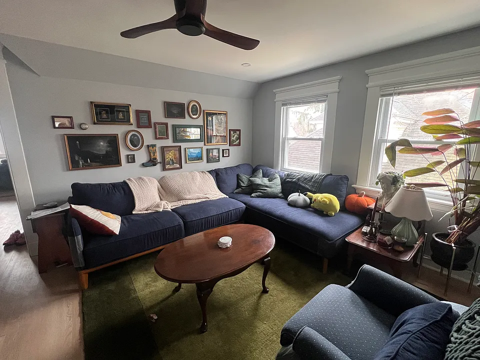 Living Room with a ceiling fan (not furnished)