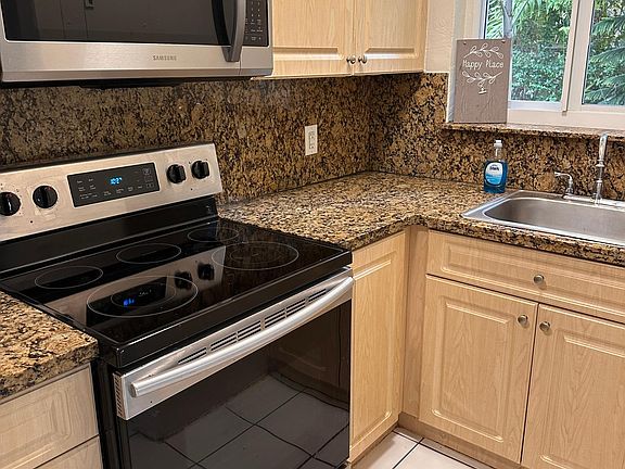 The unit has full impact windows to withstand hurricane winds