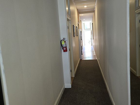 Looking door hallway from kitchen to backdoor