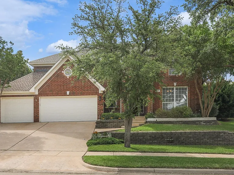 1012 Canongate Dr, Flower Mound features 4 bedrooms, 3 bathrooms, 3-car garage and a private office.