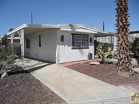 Front view/side patio