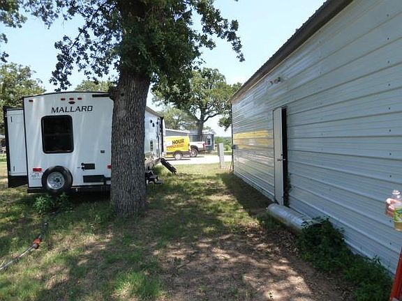 RVHOOK UP WITH ELECTRIC AND SEWER DROP.