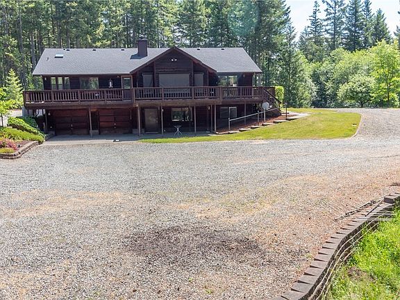 Two car finished garage underneath deck with extra deep bays. 