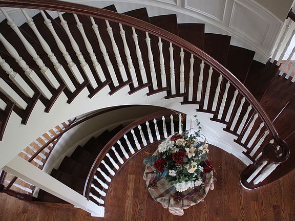 2 curved staircases