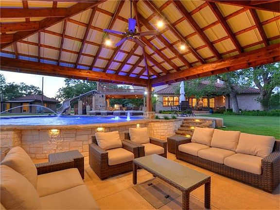 Secondary cabana with swim up bar- immaculate stonework, lighting, also has SONOS surround, flatscreen, cable etc.. no detail was overlooked