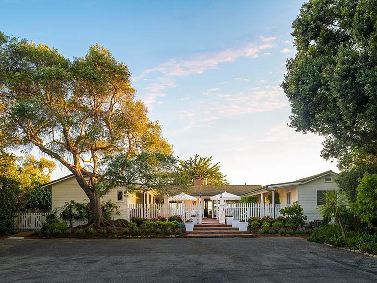 Front of house. Showing courtyard that has a gate to keep kids and pets in. We have a large open driveway great for kids to ride trikes and lots of on sight parking.