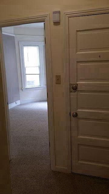Bedroom with windows and closet
