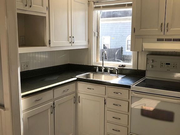 Kitchen. Window to back yard.