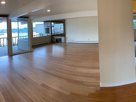 View of the South end of the living room with the window blinds up