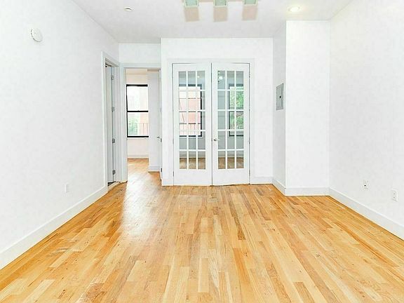 3rd image of 54 Lewis Ave Back 3