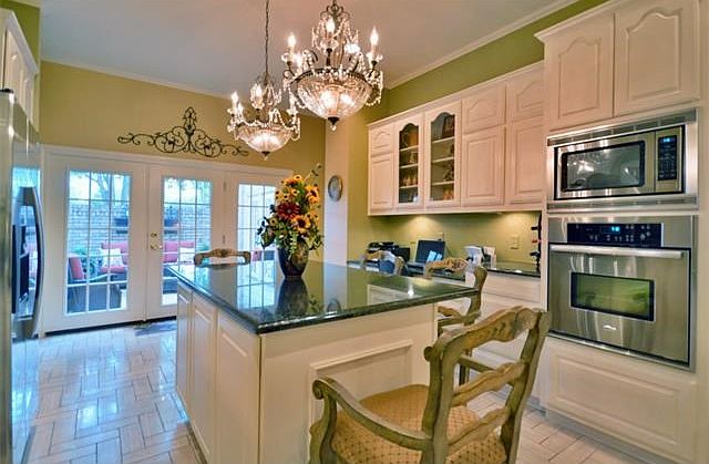 VIEW FROM KITCHEN INTO COURTYARD