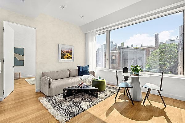 1st image of 32 E 1st St APT 4E