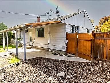 Covered patio off kitchen in back yard.
Back Yard is fully fenced, garden area and a shed for storage.