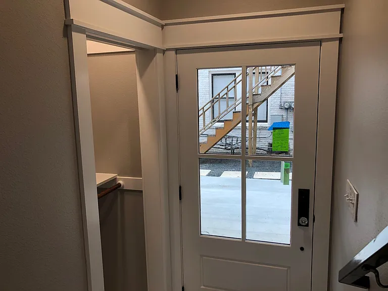 mud room area/storage closet and works as a coat closet as well near front entry