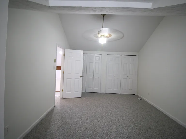 Spacious upstairs bedroom with 3 closets