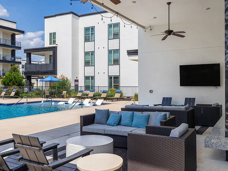 Rhythm Covered Pool Area with Outdoor TV and Seating
