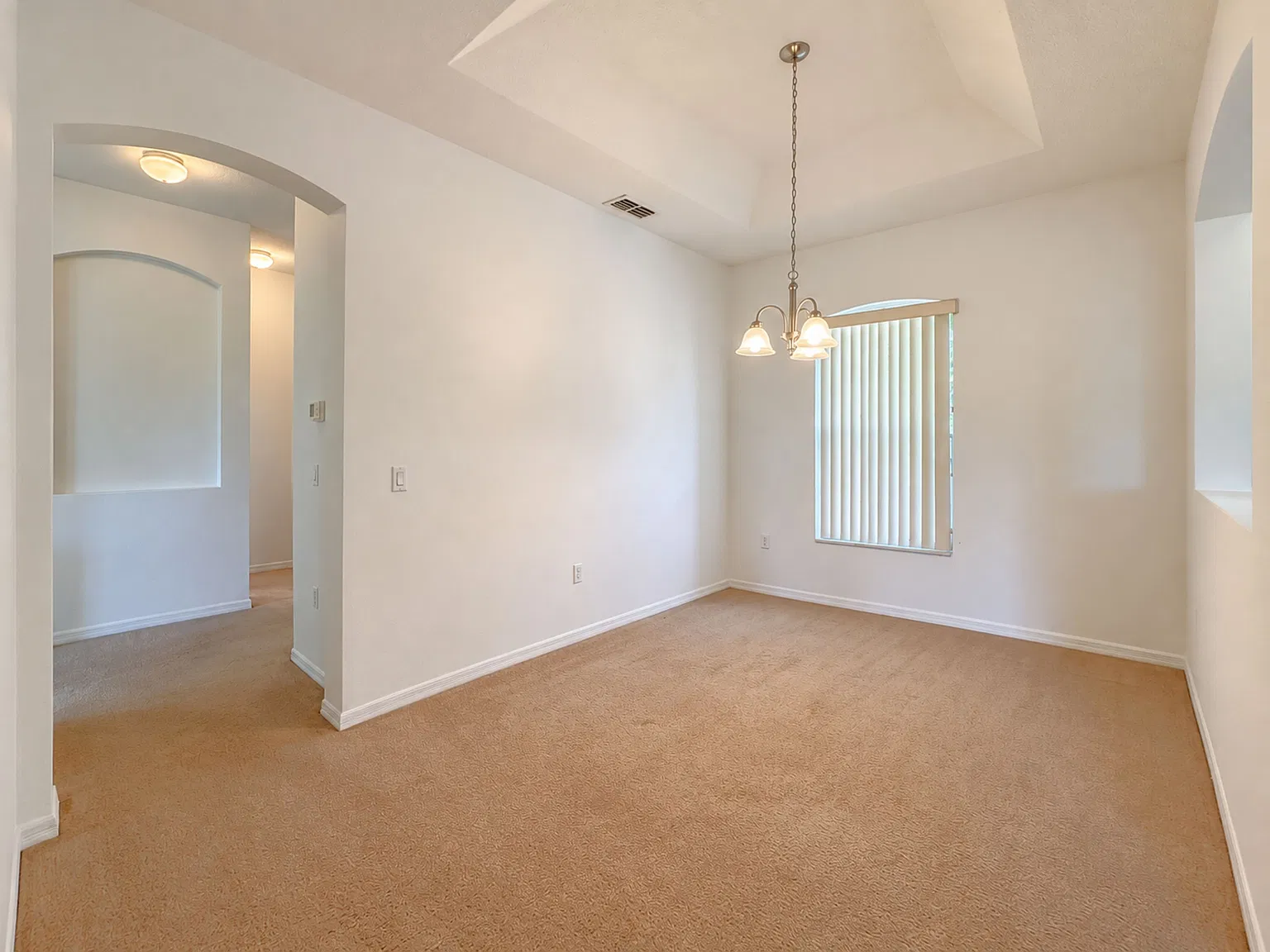 Resort-Style Living! Gorgeous 4 Bed/3 Bath Bellalago Home with 3-Car Garage. No Rear Neighbors! — Photo 4