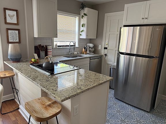 well appointed kitchen with ample storage and modern/new appliances