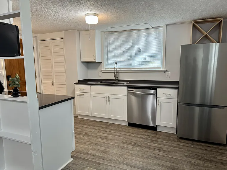 New appliances, counters and cabinets