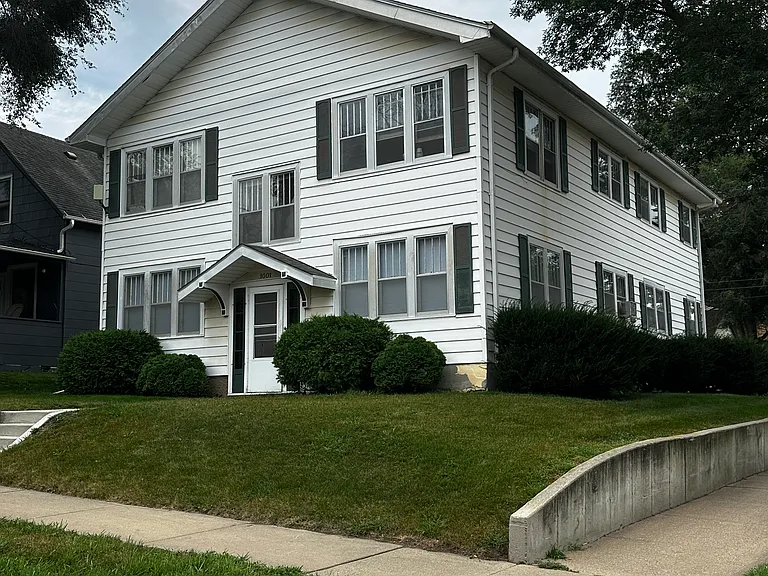 6 unit building at the corner of 18th Street & 2nd Avenue. Subject unit is on upper right hand corner.