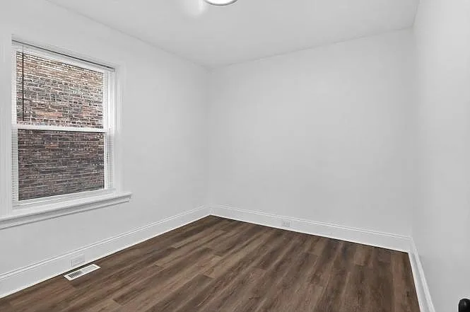 7148 S Eberhart Ave #1AA — Photo 6
