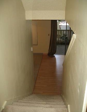 View from bedroom hallway down to the patio door