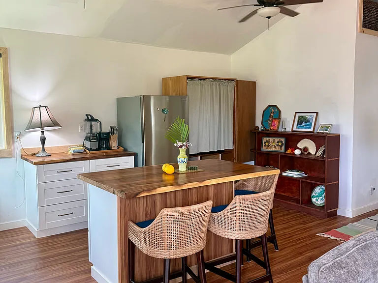 Beautifully designed kitchen and dining area with saman wood throughout