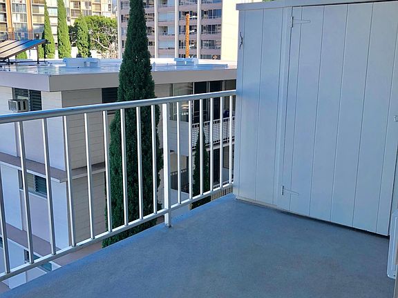 Covered balcony with large storage