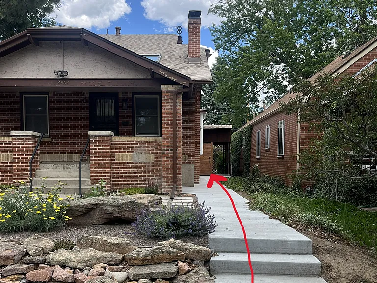 Private, locked entrance in back of house behind locked gate